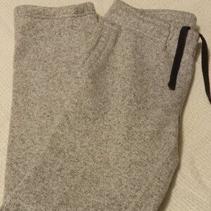 Gently used ladies Roots fleece joggers size xs with pockets but faded logo